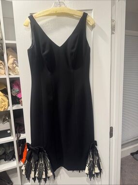 Lourdes Chavez  Black Sleeveless Dress with Tassel Hem